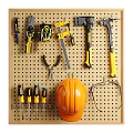 Organized Tool Set On Pegboard With Pliers Hammers Screwdrivers And Safety Helmet