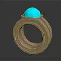 Elegant Ring With Blue Gemstone On Top And Intricate Metallic Band With Small Blue Accents