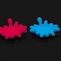 Red and Blue Splatter Shaped Art Installation Against Black Background 3d model