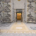 Grand Interior Hall With Symmetric Geometric Wall Decorations Central Entrance Patterned Carpet And Stone Flooring