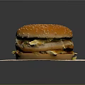 Delicious Hamburger With Sesame Bun Lettuce And Patty On White Paper