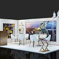 Modern Exhibition Booth With Reception Desk Cityscape Backdrop White Tables Chairs And Chandeliers