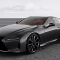 Black Lexus Sports Car With Sleek Aerodynamic Design And Alloy Wheels On Open Road