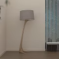 Modern Floor Lamp With Curved Stand And Beige Shade In Living Room With Wooden Floor