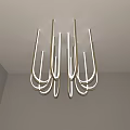 Modern U Shaped Metallic Chandelier With Illuminated Tubes In Minimalist Room