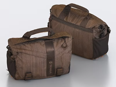 Two Textured Brown Black Travel Bags Featuring Durable Handles And Zippered Compartments 3d model