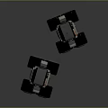 Two Mechanical Robots With Screen Heads Large Wheels And Black Silver Orange Details
