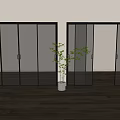 Modern Black Framed Glass Sliding Doors With Green Plant In White Planter And Wooden Floor