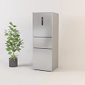 Three Door Stainless Steel Refrigerator Freezer With Green Plant In Light Colored Background