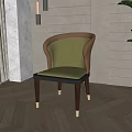 Elegant Green Upholstered Dining Chair With Brown Wooden Frame Golden Legs On Wooden Floor With Green Plant