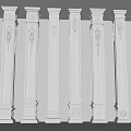 White Carved Columns Neatly Arranged Against Light Colored Walls With Lighting