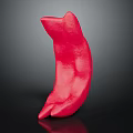 Red Human Organ Sculpture With Hairy Surface Displayed On Black Background