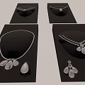 Stylish Necklaces Featuring Flower Teardrop Pendants And Pearl Accents On Black Displays