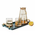 Elegant Glass Tea Set with Gold Handles Dark Tray Lemon Slices and Rosemary