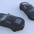 Two Black Modern Sports Cars With Sleek Design And Aerodynamic Body