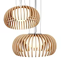 Two Modern Wooden Pendant Lights With Striped Structure And Warm Light