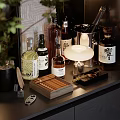 Elegant Wine Bottles And Glasses Display With Cigar Box Ice Bucket And Decanter