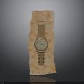 Gold Watch With Circular Dial Placed On Orange Textured Decorative Surface