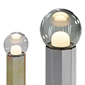 Modern Floor Lamps With Cylindrical Metallic Bodies And Spherical Glowing Shades