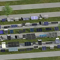 Various Solar Panels As Daily Electrical Appliances Arranged On Grassland With Trees