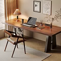 Cozy Wooden Desk Workspace With Table Lamp Laptop Plant Chair And Wall Art