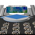 Global Mobile Power And Materials Technology Summit Expo Conference Setup With Stage Large Screen And Round Tables