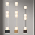 Three Modern Floor Lamps With Sleek Metal Frames And Square White Shades