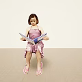 Little Girl In Pink Dress And Sandals Sitting On Floor Reading Open Book