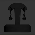Elegant Gold Diamond Earrings on Gray Round Base Jewelry Display Stand