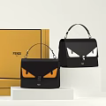 FEBI Black Handbags With Eye Design And Yellow Box