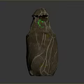 Stone Wood Sculpture With Green Gemstone In Center And Natural Texture