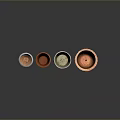 Set of Four Colorful Decorative Flower Pots with Textured Surfaces and Assorted Colors