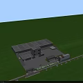 Industrial Factory Building With Green Lawn Surroundings Multiple Structures Parking Area And Road