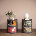 Stylish Black Bedside Tables With Colorful Patterns Floral Bouquet Candle Gold Candleholders And Books
