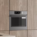 Modern Kitchen Interior With Dark Light Wood Cabinets Counter And Oven