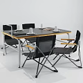 Folding Table And Chair Set With Black Tabletop Yellow Edges And Metal Legs