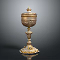 Antique Golden Decorative Ornament Piece With Intricate Carvings Lidded Top And Ornate Base