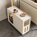 White Modern Side Table with Wheels Arched Cutouts and Coffee Cup Tray Next to Sofa