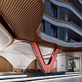 Modern High Rise Building Entrance With Red V Shape Accent Green Plants And Stone Pathway