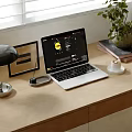 Laptop Setup On Wooden Desk With Desk Lamp Mouse Coffee Cup Potted Plant And Books