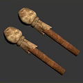 Two Household Kitchen Items With Natural Wooden Handles And Rustic Brown Texture