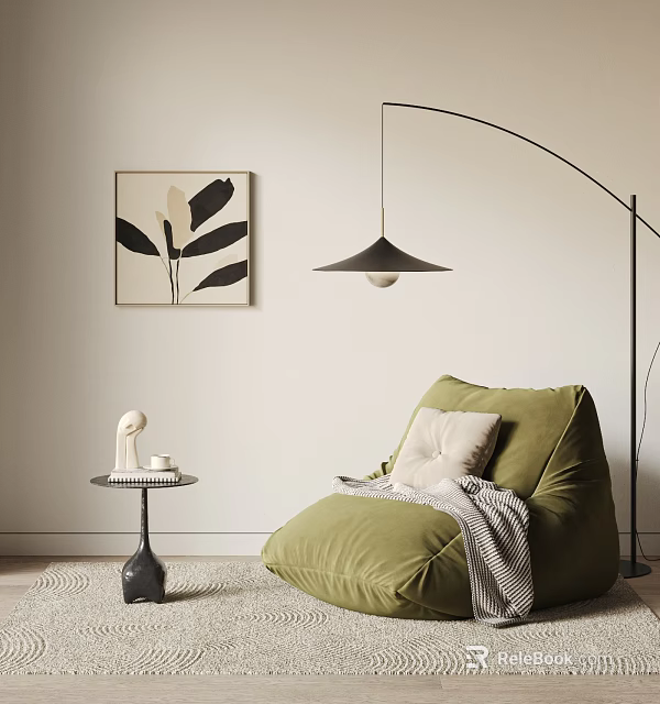 Green Bean Bag Chair With Pillow Blanket In Living Room Floor Lamp And Leaf Wall Art 3d model 