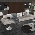 Beige Sectional Sofa with Plaid Blanket and Throw Pillows in Modern Living Room with Bookshelves