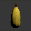 Ripe Yellow Banana With Brown Spots And Stem On Dark Background