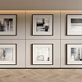 Six Framed Abstract Paintings in Two Rows Three Columns on Light Wall with Herringbone Floor
