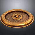 Ornate Golden Circular Metal Plate With Carved Patterns And Central Conical Ornament