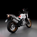 White Red Adventure Motorcycle With Modern Design Sleek Body And Golden Wheels