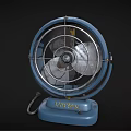 Vintage Blue Fan With Metal Grille And Classic Base Design For Home Cooling