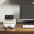 Modern Computer Workspace With Monitor Keyboard Wooden Shelves Green Plant Clock And Books
