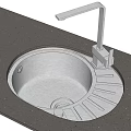 Stainless Steel Kitchen Sink On Dark Granite Countertop With Modern Faucet And Drainboard